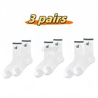 3 pairs of white long stockings